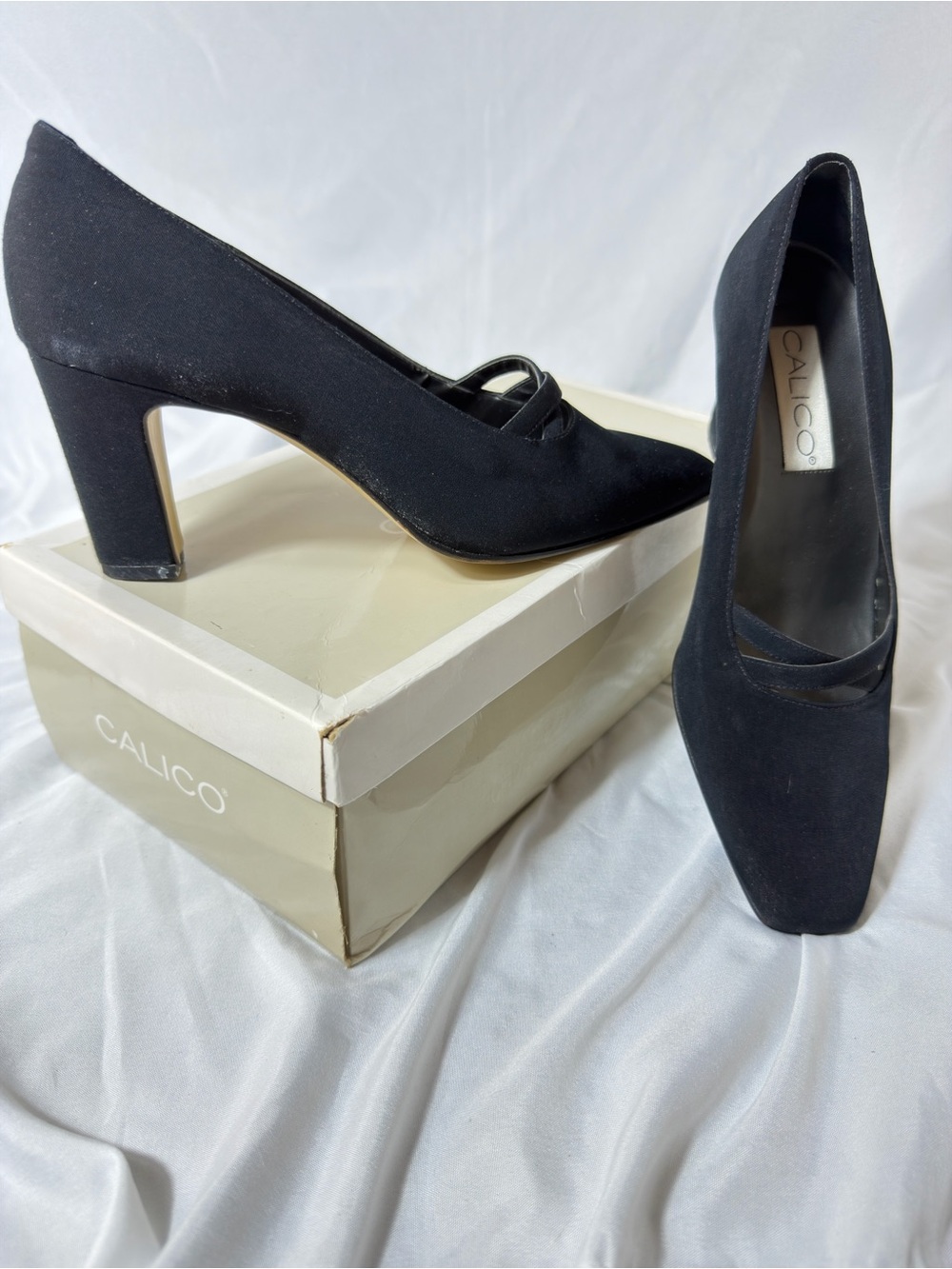 Calico black pumps 7.5